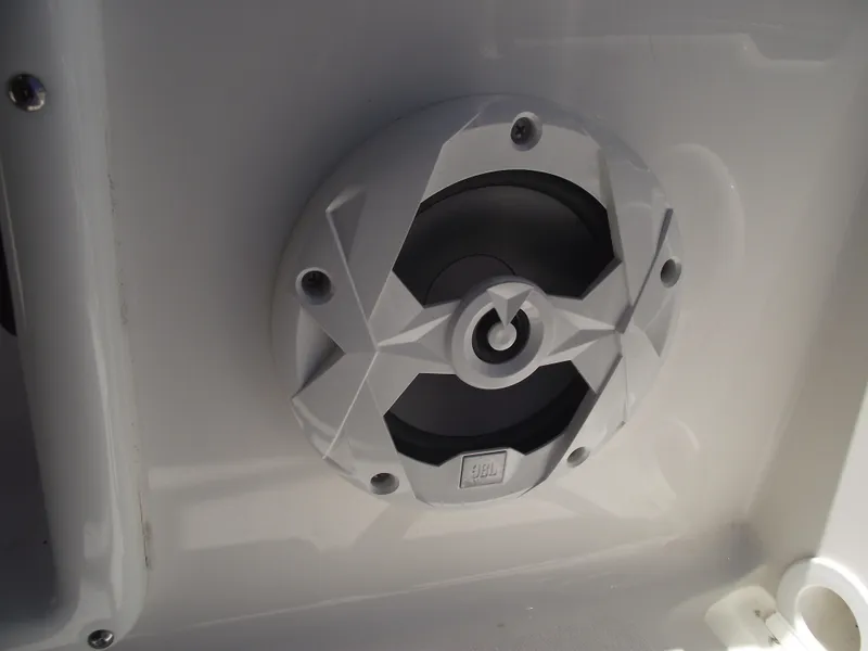 Slide: The Image of White speaker on 2022 NauticStar 191 Hybrid boat interior. - 22