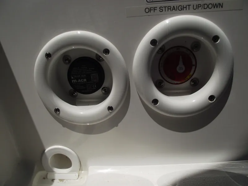 Slide: The Image of 2022 NauticStar 191 Hybrid boat controls with dual circular panels. - 32