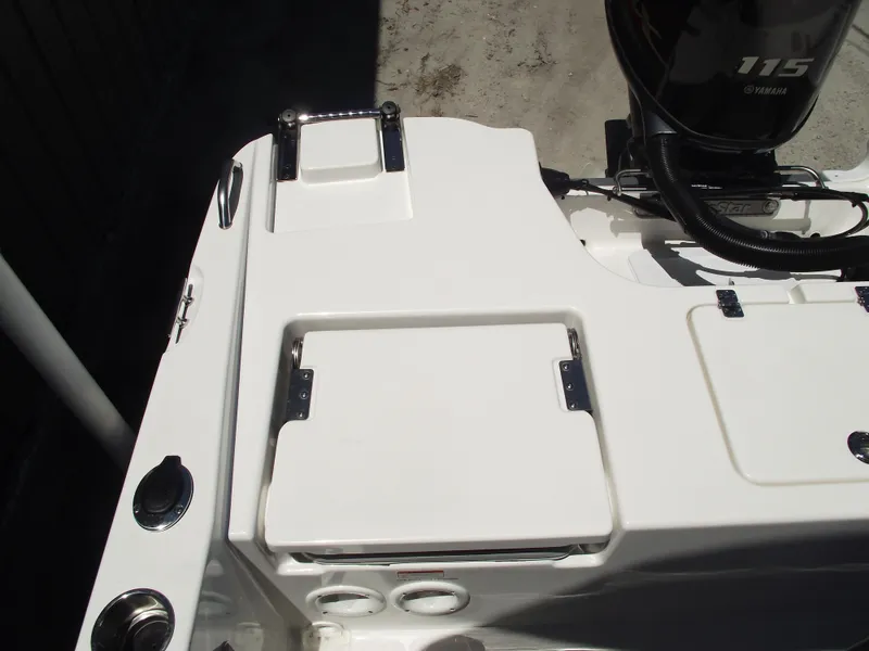 Slide: The Image of 2022 NauticStar 191 Hybrid boat deck with Yamaha 115 engine. - 33