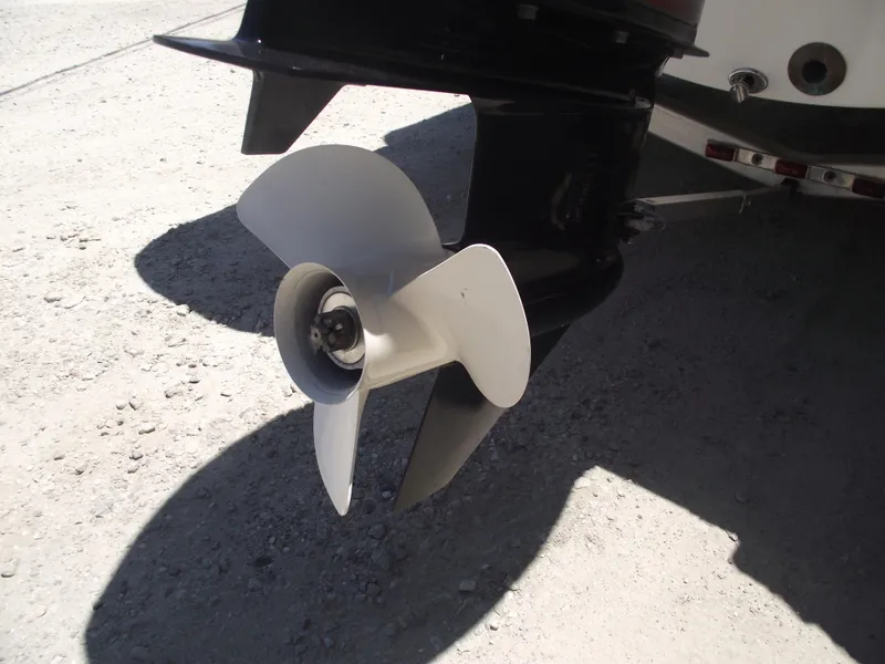 Slide: The Image of Propeller of 2022 NauticStar 191 Hybrid boat on dry ground. - 5
