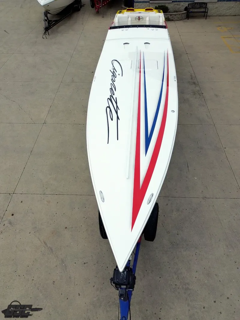 Slide: The Image of 2001 Cigarette 42 Tiger speedboat with sleek design and vibrant red, white, and blue accents. - 18