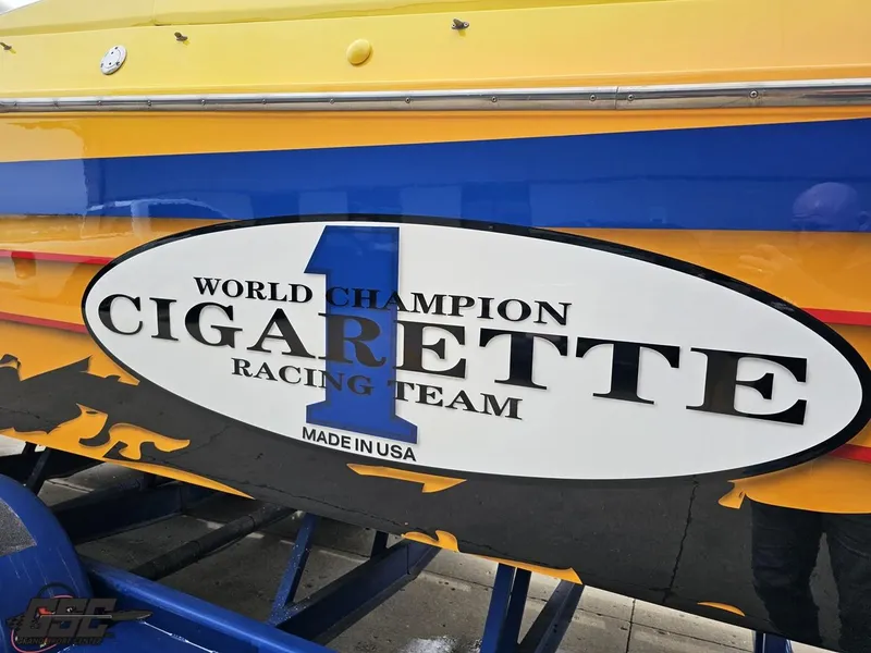 Slide: The Image of 2001 Cigarette 42 Tiger boat with "World Champion Racing Team" logo. - 30
