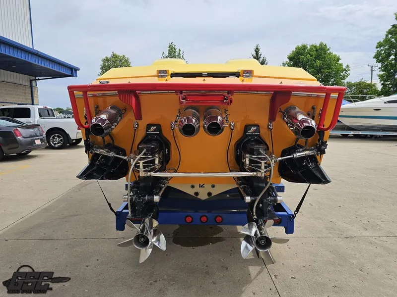 Slide: The Image of Rear view of a 2001 Cigarette 42 Tiger boat with powerful engines and propellers. - 31