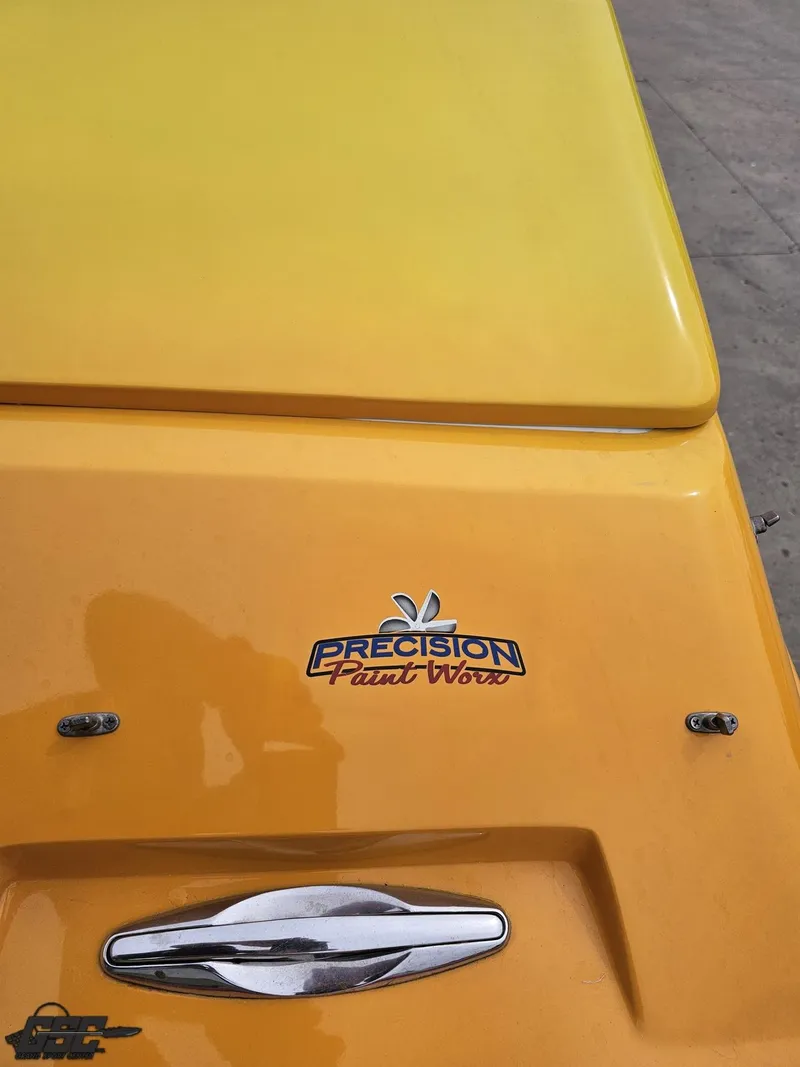 Slide: The Image of Yellow Cigarette 42 Tiger boat, 2001 model, featuring "Precision Paint Work" logo. - 36