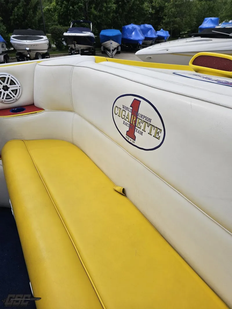 Slide: The Image of 2001 Cigarette 42 Tiger boat interior with yellow and white seating. - 46