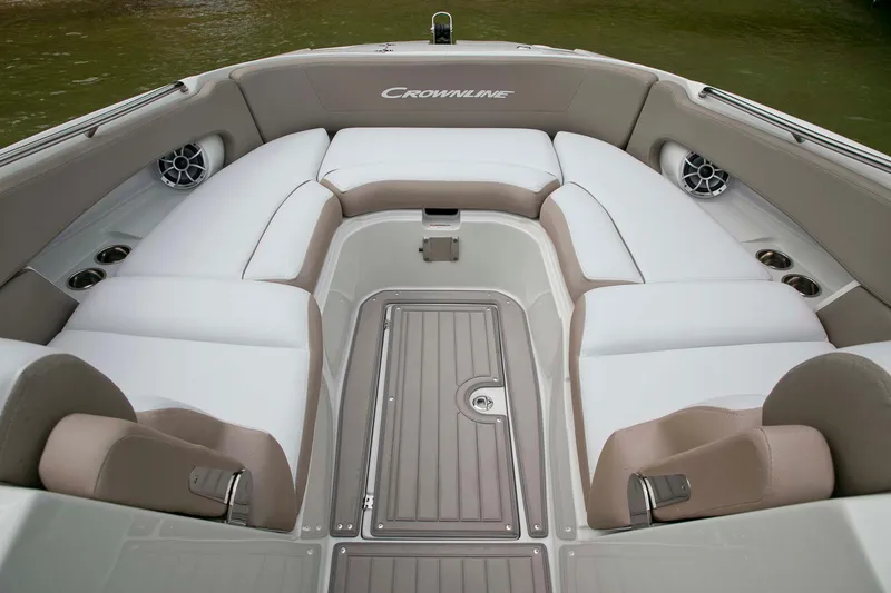 Slide: The Image of 2024 Crownline E305 boat interior with spacious seating and modern design. - 13