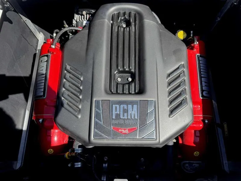 Slide: The Image of 2017 Nautique GS20 engine, PCM marine engine with red accents. - 12