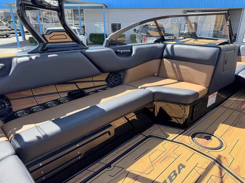 Slide: The Image of 2025 Moomba Max boat interior with sleek seating and modern design. - 4