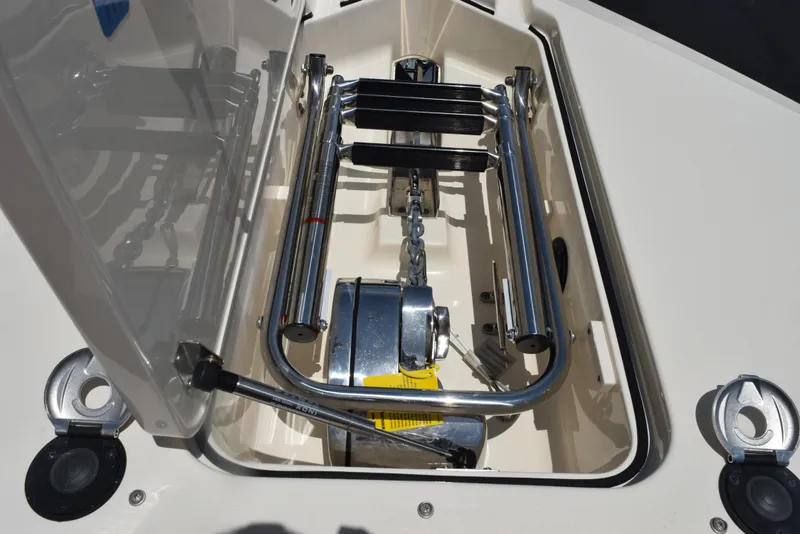 Slide: The Image of 2023 Scout 277 Dorado boat anchor storage compartment with stainless steel fittings. - 44