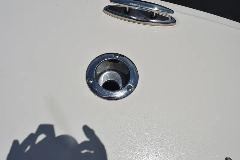 Slide: The Image of 2023 Scout 277 Dorado boat deck with metal fitting and cleat. - 45