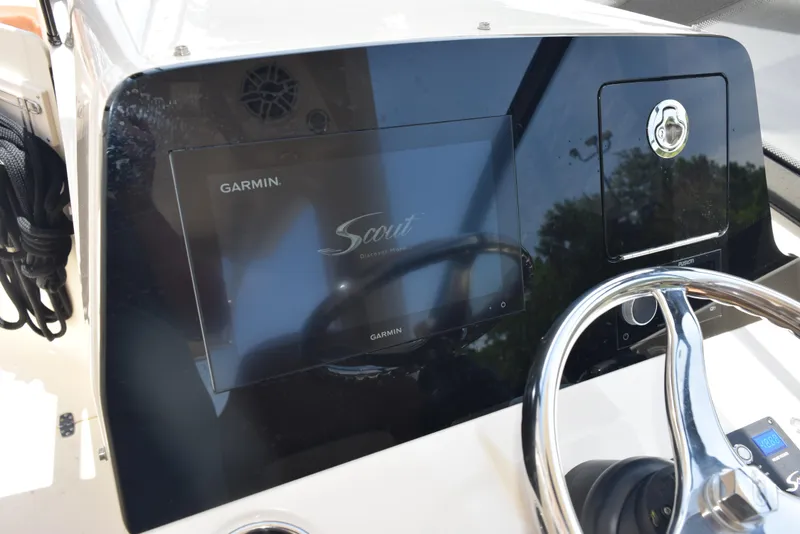 Slide: The Image of 2023 Scout 277 Dorado dashboard with Garmin display and steering wheel. - 48