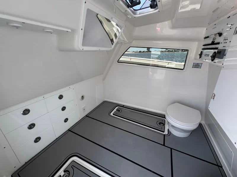Slide: The Image of Interior of 2026 Caymas 44 CT boat with modern bathroom and sleek design. - 32