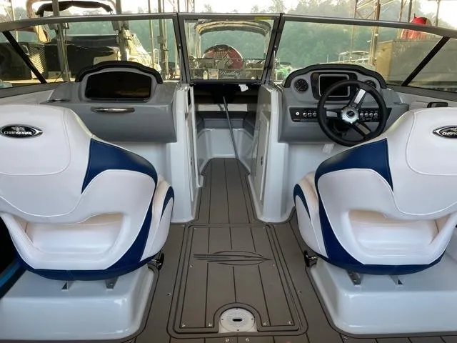 Slide: The Image of Interior of 2020 Chaparral 21 Surf boat with dual seats and modern dashboard. - 10