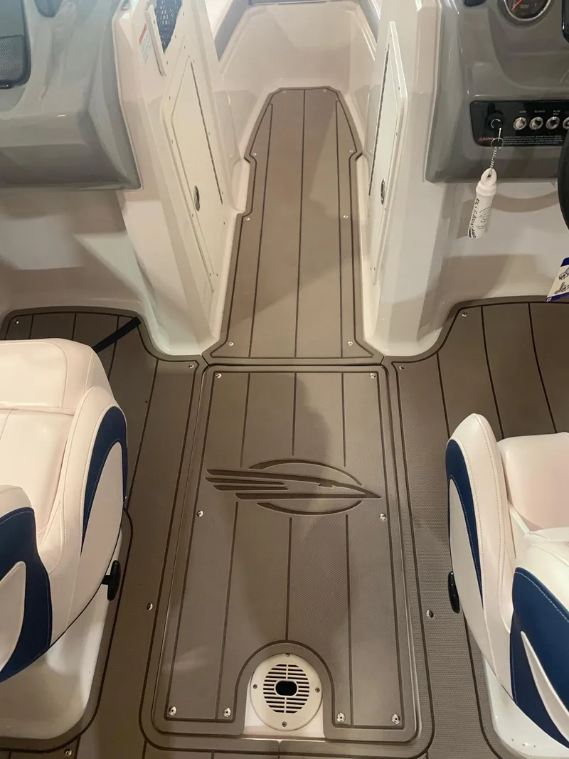 Slide: The Image of 2020 Chaparral 21 Surf boat interior with sleek seating and stylish flooring design. - 21