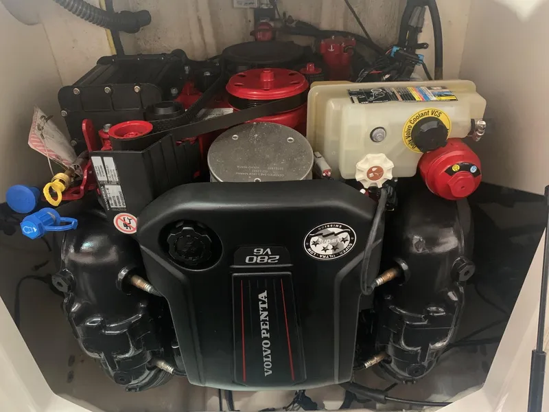 Slide: The Image of Engine of 2020 Chaparral 21 Surf boat, featuring a Volvo Penta V6 280 horsepower motor. - 25