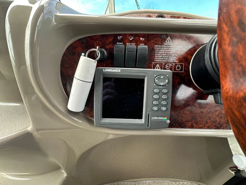 Slide: The Image of Control panel of 2002 Four Winns 268 Vista boat with Lowrance navigation system. - 21