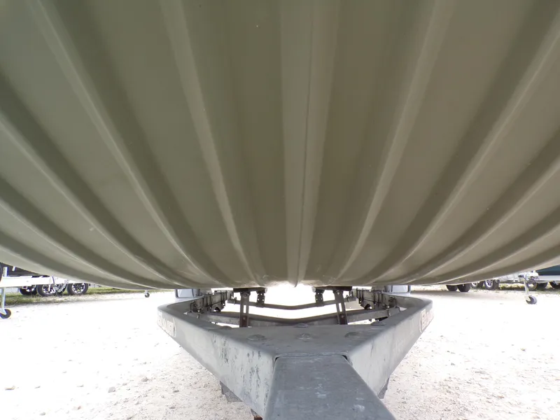 Slide: The Image of 2024 Southfork 1662 EXLSF boat hull on trailer, viewed from below. - 6