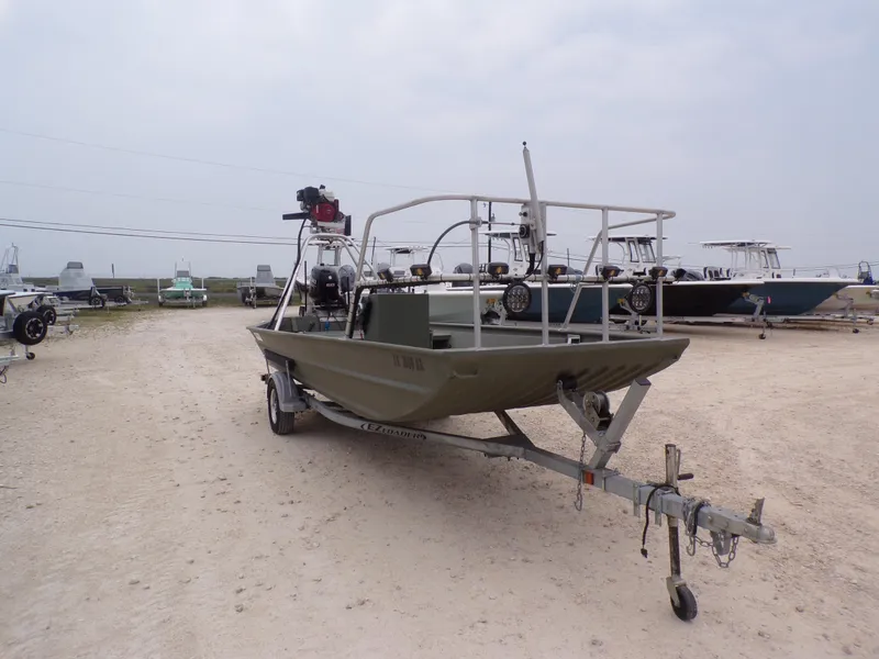 Slide: The Image of 2024 Southfork 1662 EXLSF boat on trailer in outdoor lot. - 7