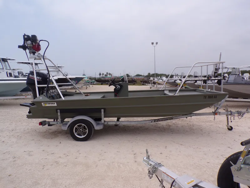 Slide: The Image of 2024 Southfork 1662 EXLSF boat on trailer, parked outdoors. - 8