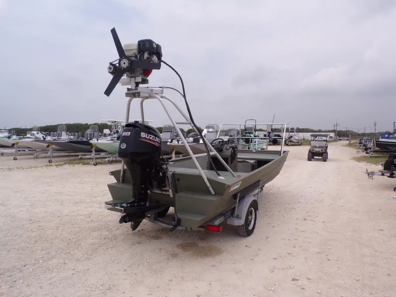 Slide: The Image of 2024 Southfork 1662 EXLSF boat with Suzuki outboard motor on a trailer. - 9