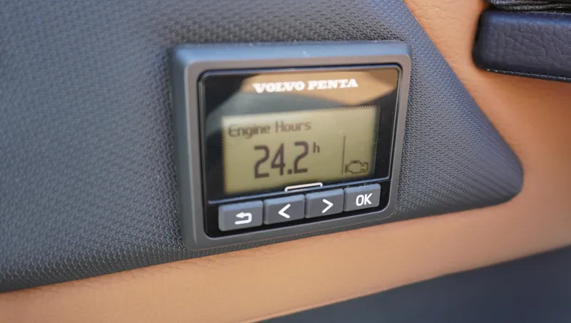 Slide: The Image of Volvo Penta engine hour meter displaying 24.2 hours in a 2024 Cobalt CS23 boat. - 18