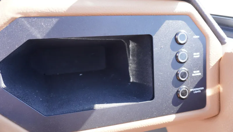 Slide: The Image of 2024 Cobalt CS23 dashboard with control buttons and storage compartment. - 21