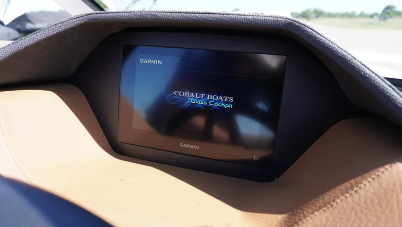 Slide: The Image of 2024 Cobalt CS23 boat dashboard with Garmin glass cockpit display. - 22