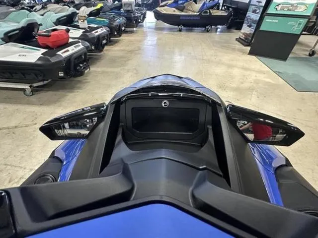 Slide: The Image of 2025 Sea-Doo Waverunner Wake in showroom, showcasing sleek design and advanced features. - 17