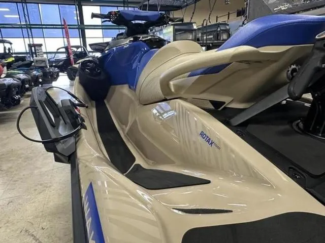 Slide: The Image of 2025 Sea-Doo Waverunner Wake in showroom, featuring sleek design and Rotax engine. - 21