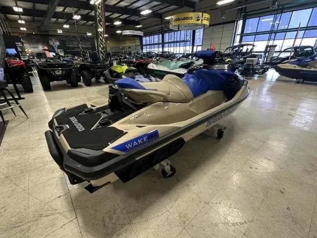 Slide: The Image of 2025 Sea-Doo Waverunner Wake on display in a showroom. - 8