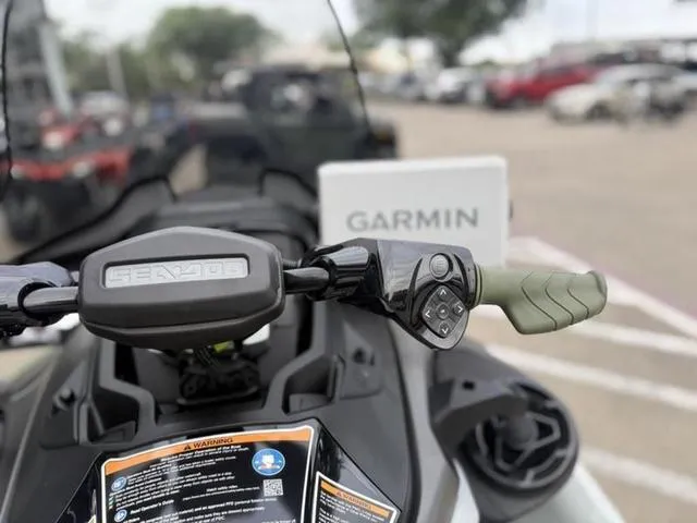 Slide: The Image of 2025 Sea-Doo Waverunner FISH PRO with Garmin navigation system, close-up of handlebars. - 9