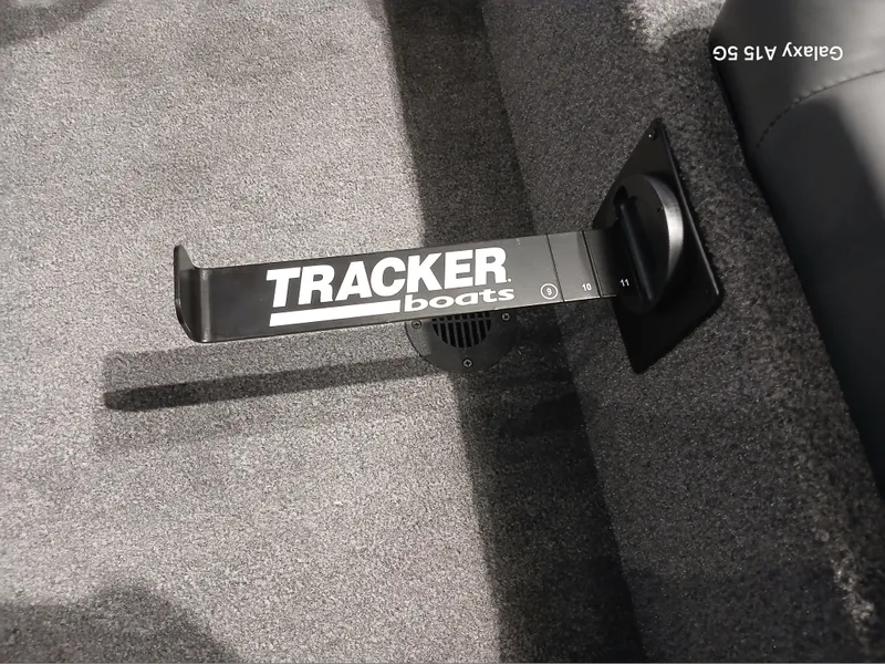 Slide: The Image of Tracker Savage 215 boat interior with branded rod holder, 2025 model. - 13