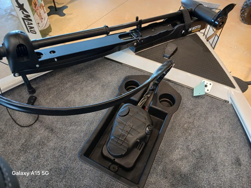 Slide: The Image of Trolling motor and foot pedal on 2025 Tracker Savage 215 boat deck. - 8