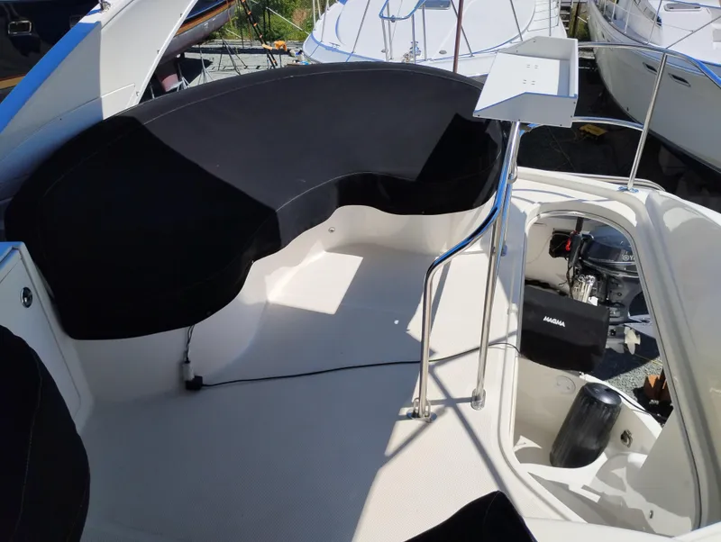 Slide: The Image of 2006 Meridian 341 Sedan boat interior with seating and control area. - 19