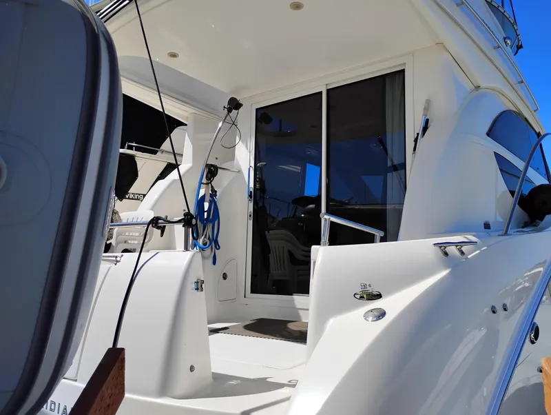 Slide: The Image of 2006 Meridian 341 Sedan yacht, featuring sleek white exterior and modern design elements. - 20