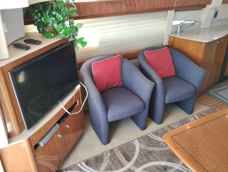 Slide: The Image of Interior of 2006 Meridian 341 Sedan with chairs, TV, and decor. - 24