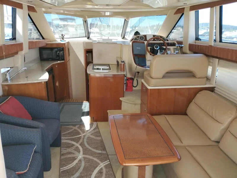 Slide: The Image of Interior of 2006 Meridian 341 Sedan yacht with luxurious seating and modern amenities. - 28