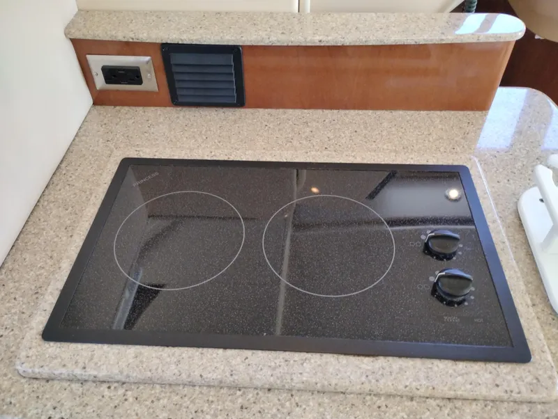 Slide: The Image of Stovetop in 2006 Meridian 341 Sedan yacht kitchen area. - 30