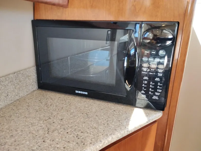 Slide: The Image of Samsung microwave on granite countertop in 2006 Meridian 341 Sedan kitchen. - 31