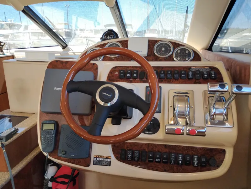 Slide: The Image of Helm of 2006 Meridian 341 Sedan with wooden steering wheel and control panel. - 37