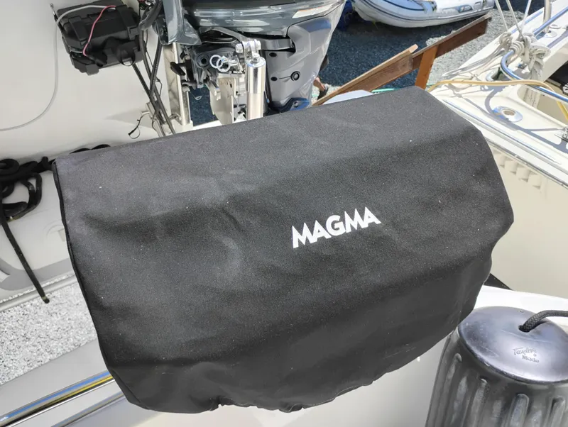 Slide: The Image of Black Magma grill cover on 2006 Meridian 341 Sedan boat deck. - 4