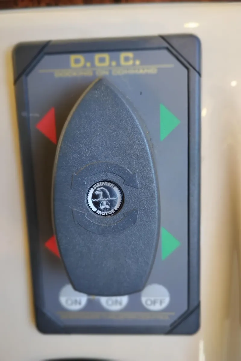 Slide: The Image of Control panel of a 2006 Meridian 341 Sedan boat with directional indicators. - 41