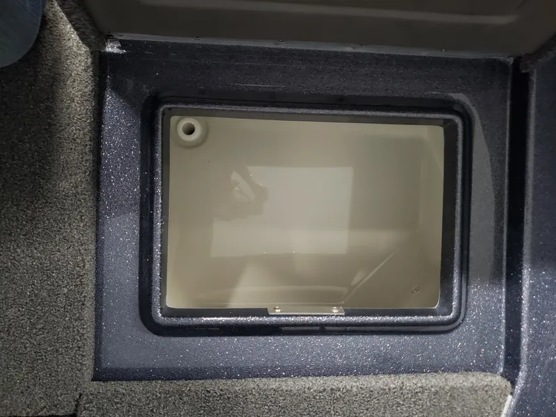 Slide: The Image of 2024 Warrior 208 boat storage compartment with a sleek, durable design. - 13