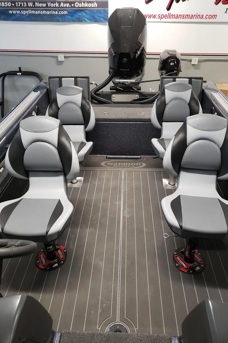 Slide: The Image of 2025 Warrior 208 boat interior with modern seating and sleek design. - 7