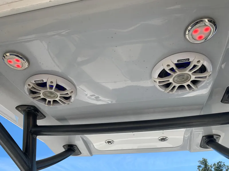Slide: The Image of Speakers and lights on a 2018 Sea Fox 248 Commander boat's overhead console. - 10