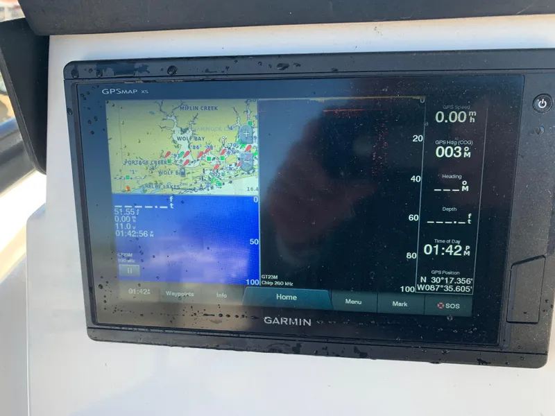 Slide: The Image of Garmin GPS display on 2018 Sea Fox 248 Commander boat, showing navigation and depth data. - 14