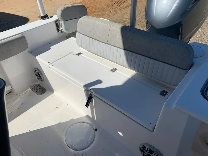Slide: The Image of 2018 Sea Fox 248 Commander boat interior with seating and storage compartments. - 17