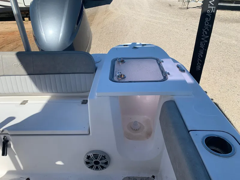Slide: The Image of 2018 Sea Fox 248 Commander boat interior with seating and storage compartment. - 18