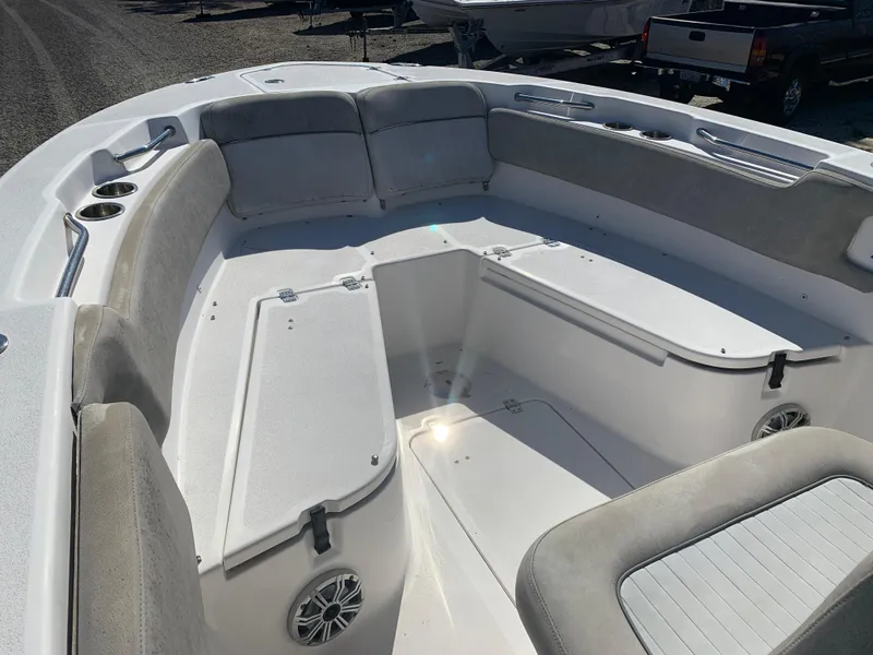Slide: The Image of 2018 Sea Fox 248 Commander boat interior with cushioned seating and storage compartments. - 19