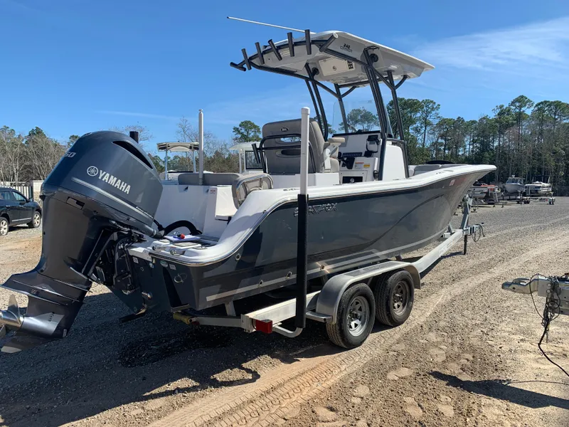 Slide: The Image of 2018 Sea Fox 248 Commander boat on trailer with Yamaha engine, parked outdoors. - 6